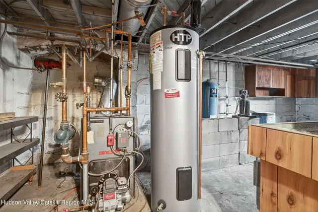 an aerial view of a houses with a lake view