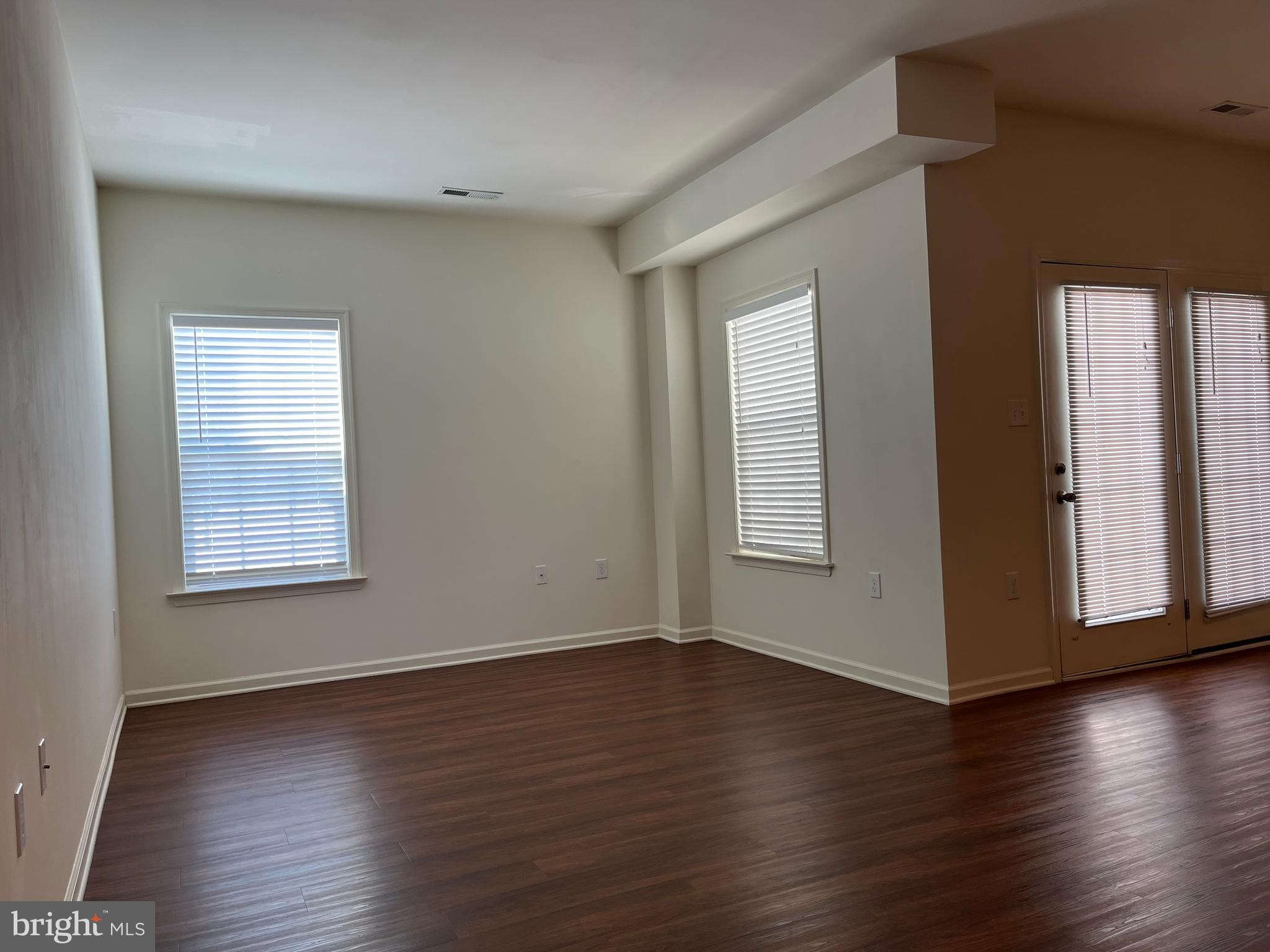 72 Chennault Trail Falling Waters, WV 25419 - Photo 16 of 38 an empty room with wooden floor and windows