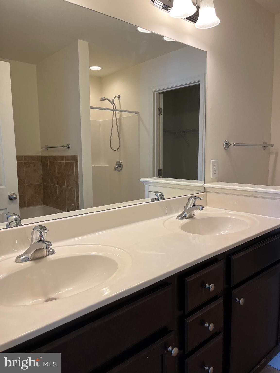 72 Chennault Trail Falling Waters, WV 25419 - Photo 24 of 38 a bathroom with a sink double vanity and a mirror