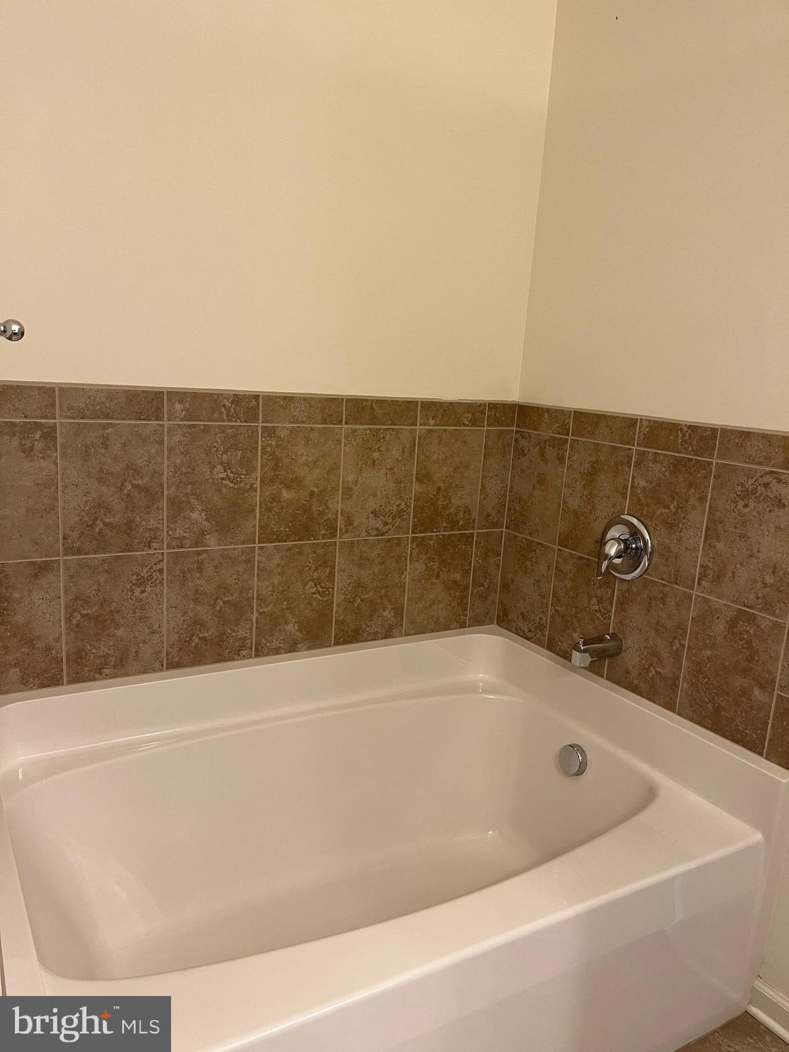 72 Chennault Trail Falling Waters, WV 25419 - Photo 29 of 38 a bathroom with a bathtub