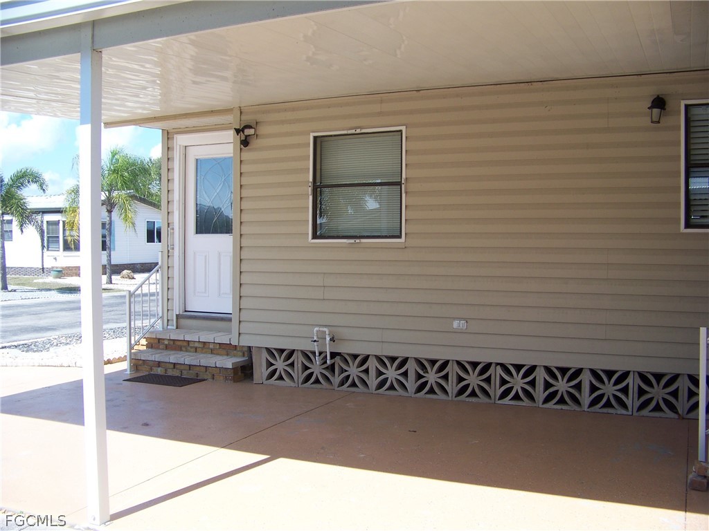 15550 Burnt Store Road, Unit 101 Punta Gorda, FL 33955 - Photo 11 of 50 a view of a door of a house