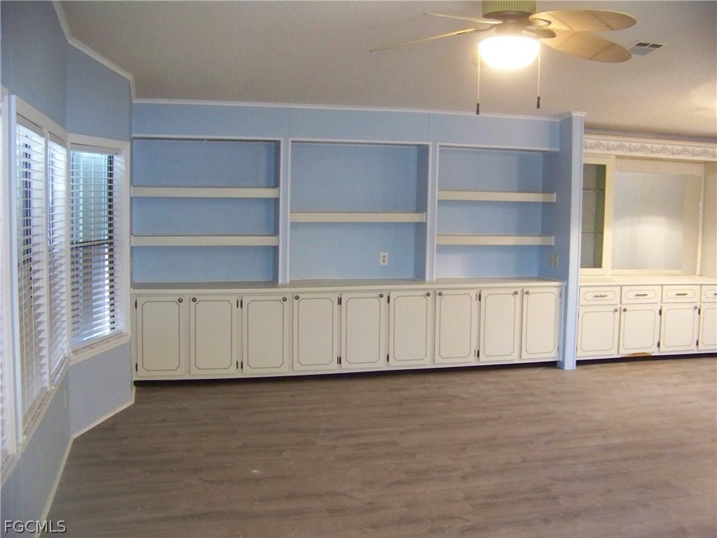 15550 Burnt Store Road, Unit 101 Punta Gorda, FL 33955 - Photo 14 of 50 a view of an empty room with a window