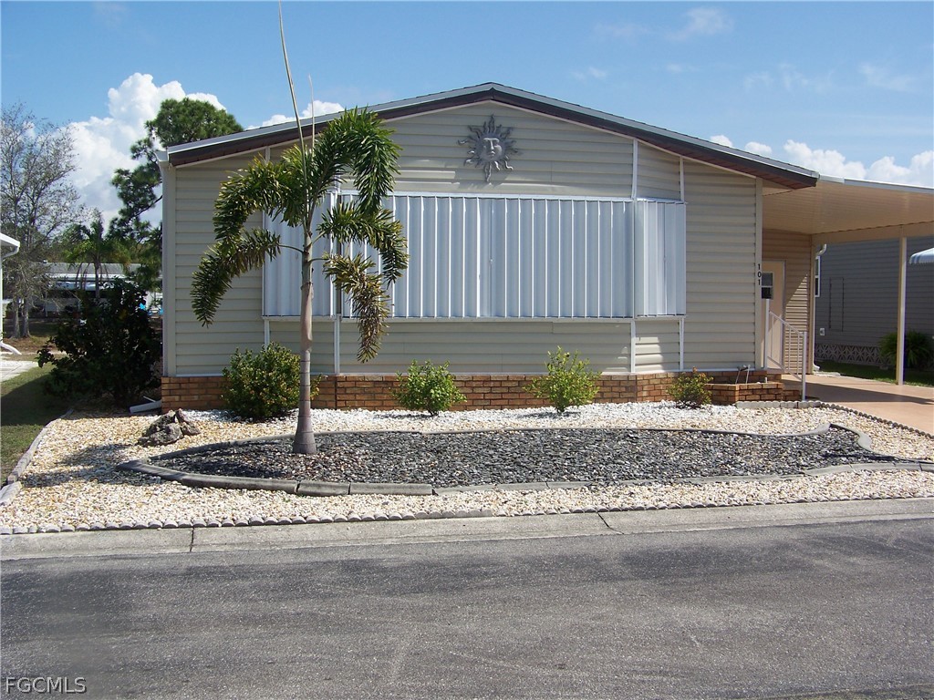 15550 Burnt Store Road, Unit 101 Punta Gorda, FL 33955 - Photo 2 of 50 a front view of a house