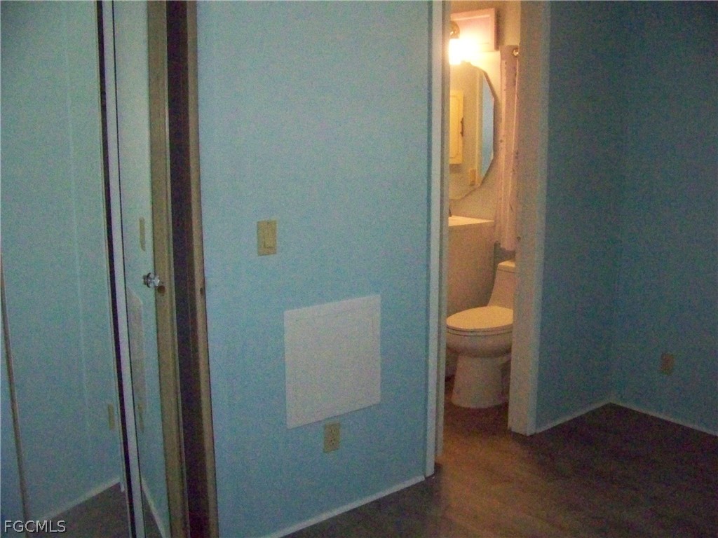 15550 Burnt Store Road, Unit 101 Punta Gorda, FL 33955 - Photo 28 of 50 a bathroom view of a toilet and a sink