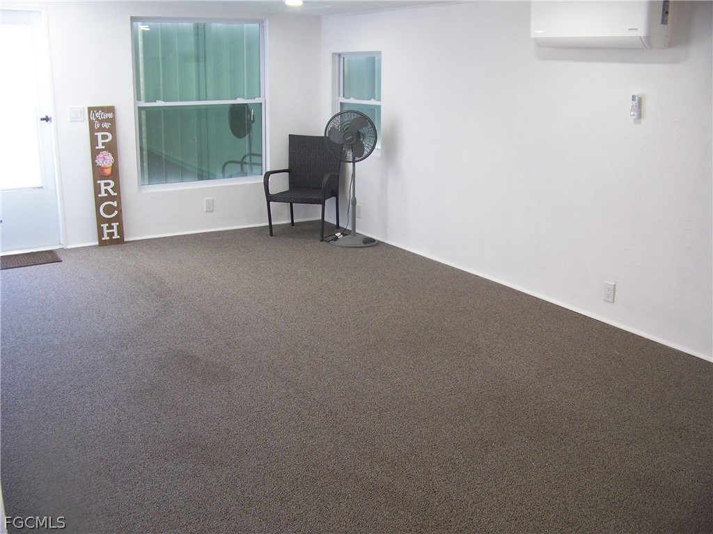 15550 Burnt Store Road, Unit 101 Punta Gorda, FL 33955 - Photo 42 of 50 a view of workspace with furniture and window