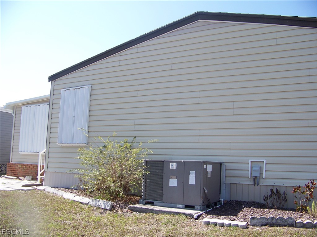 15550 Burnt Store Road, Unit 101 Punta Gorda, FL 33955 - Photo 8 of 50 a backyard of a house