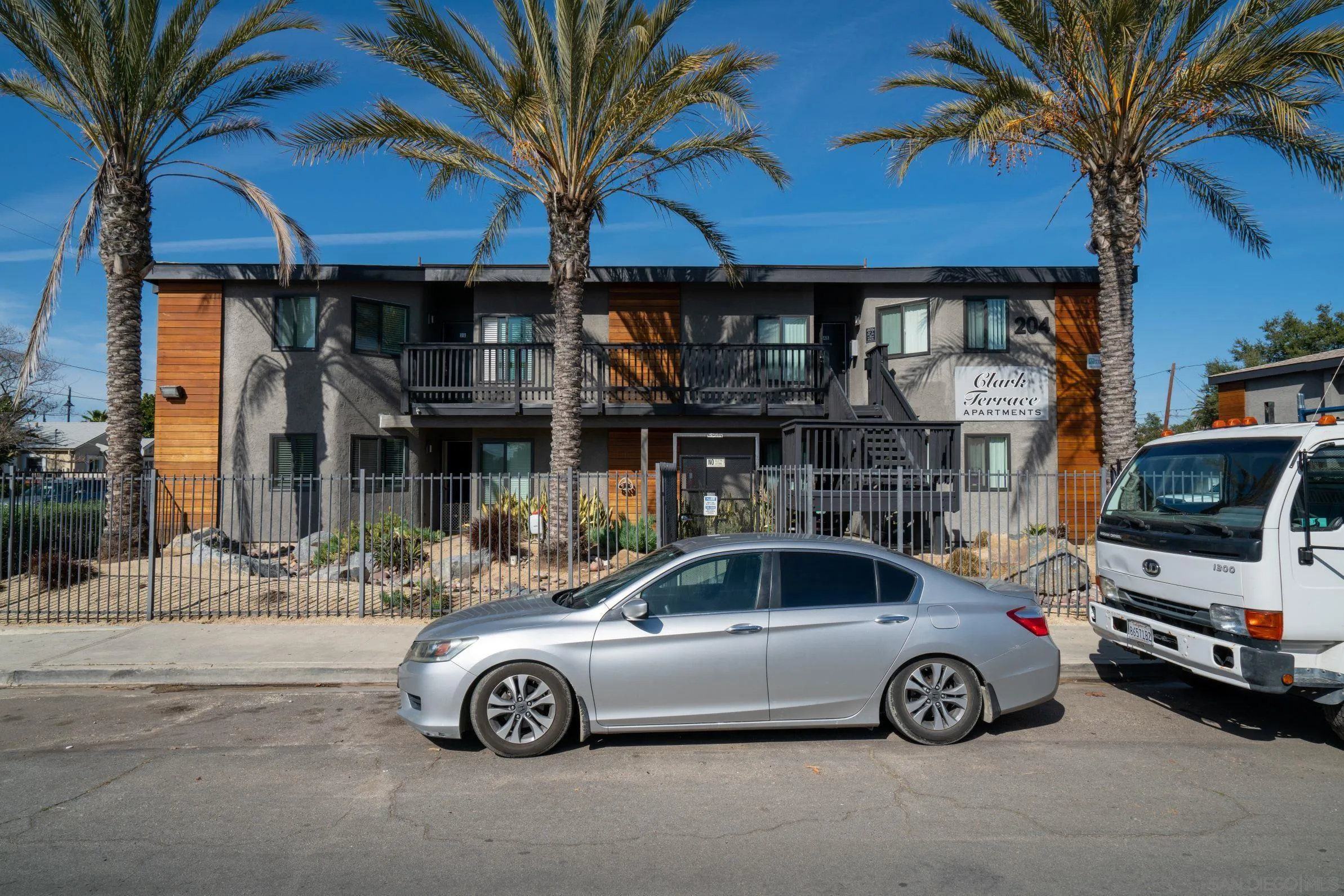 204 Clark Street Escondido, CA 92025 - Photo 4 of 6 a front view of a house with parking space