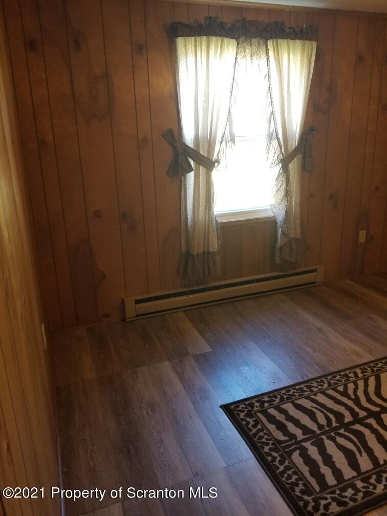 337 Main Street Forest City, PA 18421 - Photo 4 of 6 a view of a room with wooden floor and a window