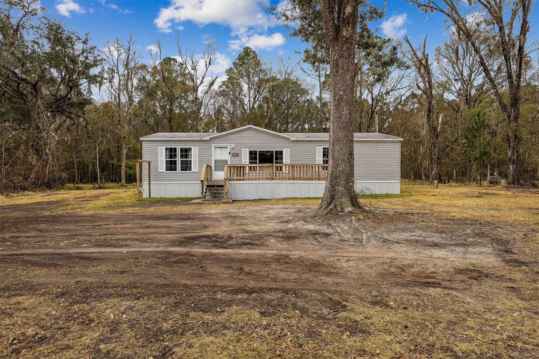 54124 Catherine Avenue Callahan, FL 32011 - Photo 13 of 29 a front view of a house with garden
