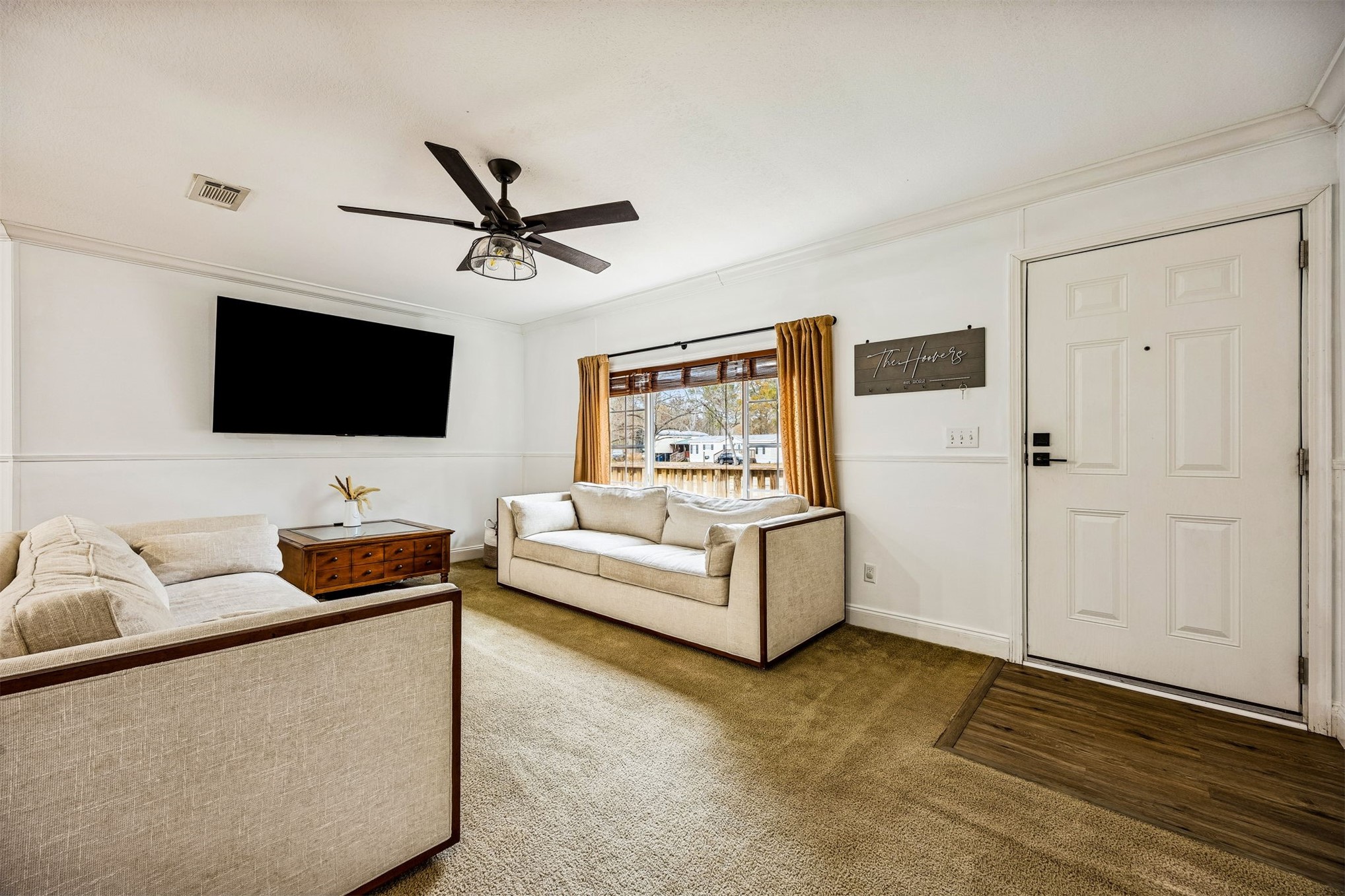 54124 Catherine Avenue Callahan, FL 32011 - Photo 20 of 29 a living room with furniture and a flat screen tv