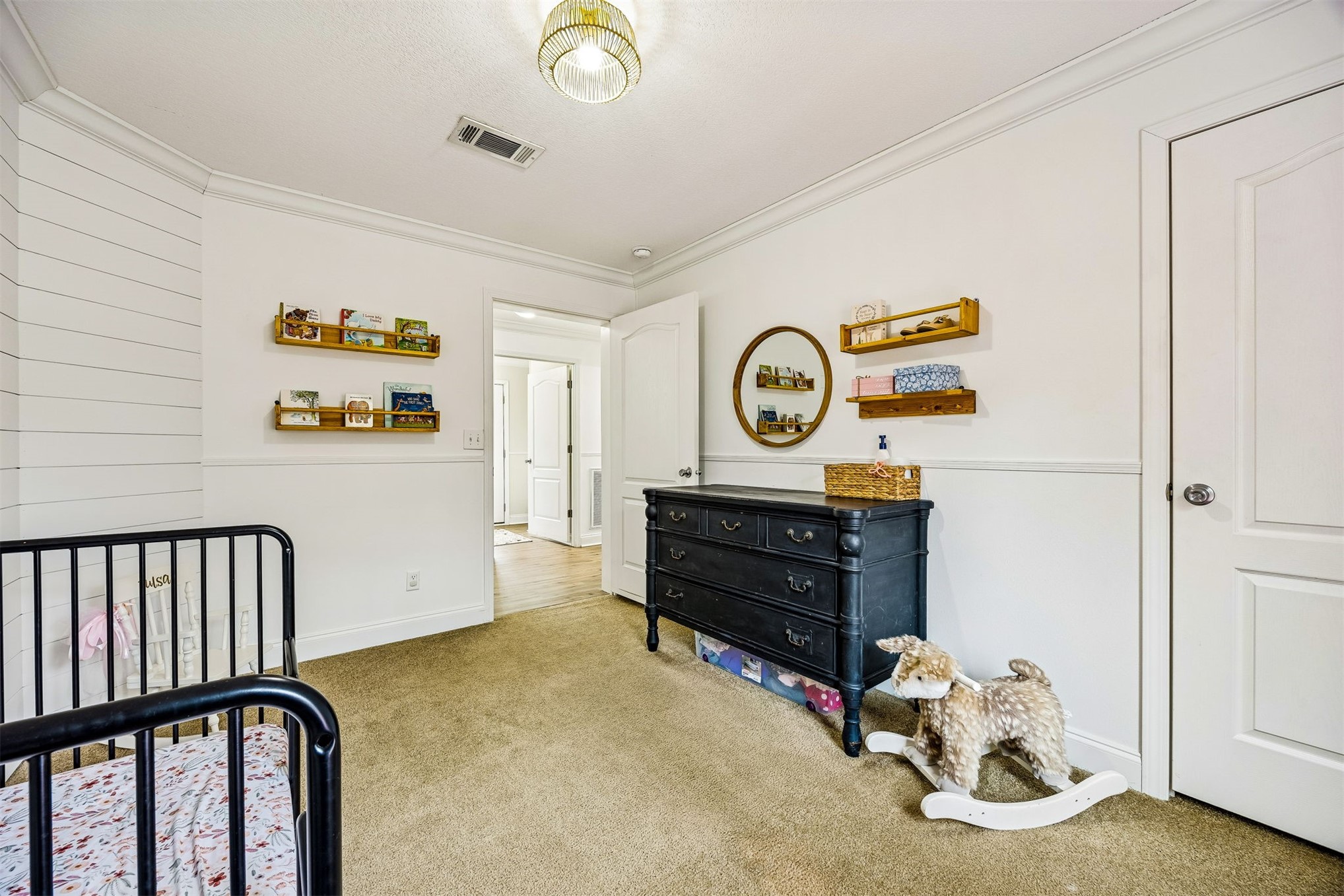 54124 Catherine Avenue Callahan, FL 32011 - Photo 28 of 29 a bedroom with a bed and cabinets