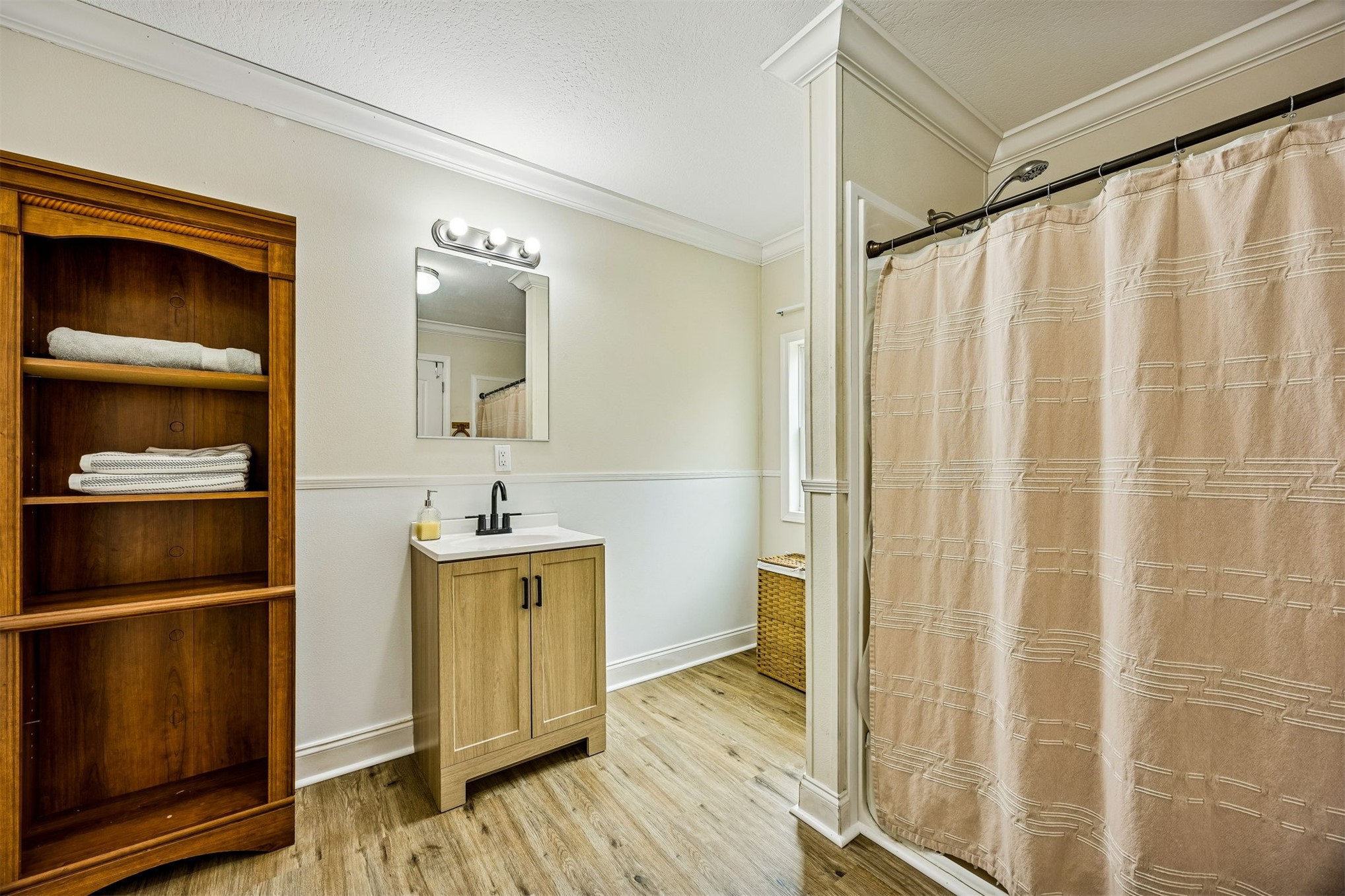 54124 Catherine Avenue Callahan, FL 32011 - Photo 6 of 29 a bathroom with a sink a toilet and shower