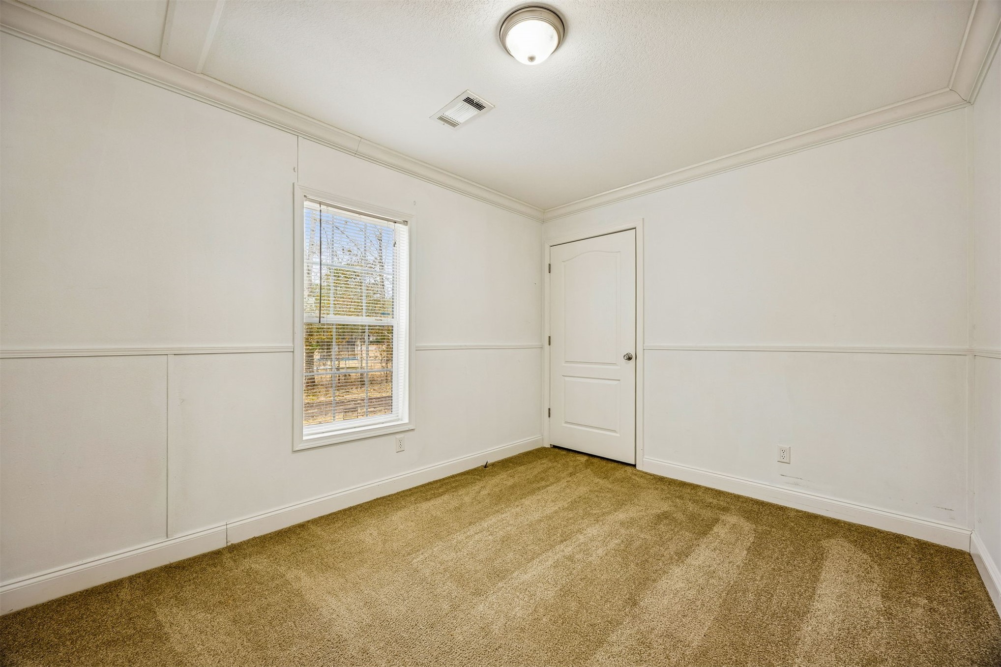 54124 Catherine Avenue Callahan, FL 32011 - Photo 9 of 29 an empty room with a empty space and windows