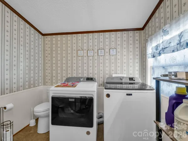 a kitchen with a stove and a sink