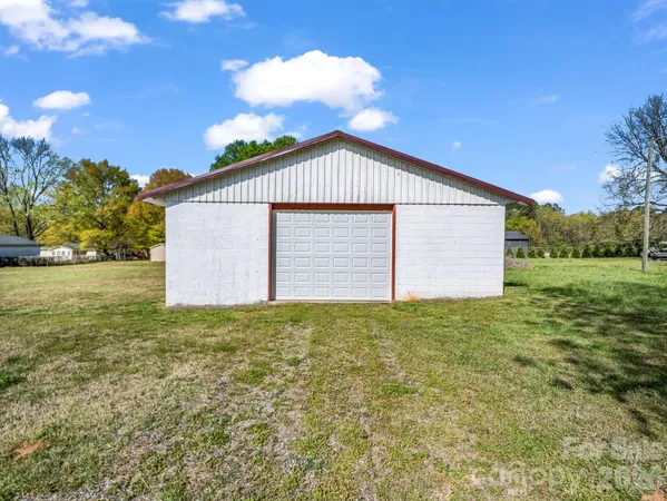 a house with garden in front of it