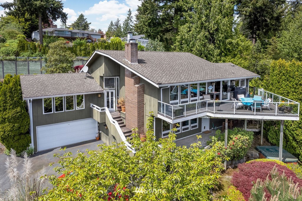 4044 East Mercer Way Mercer Island, WA 98040 - Photo 2 of 37 aerial view of a house with a yard