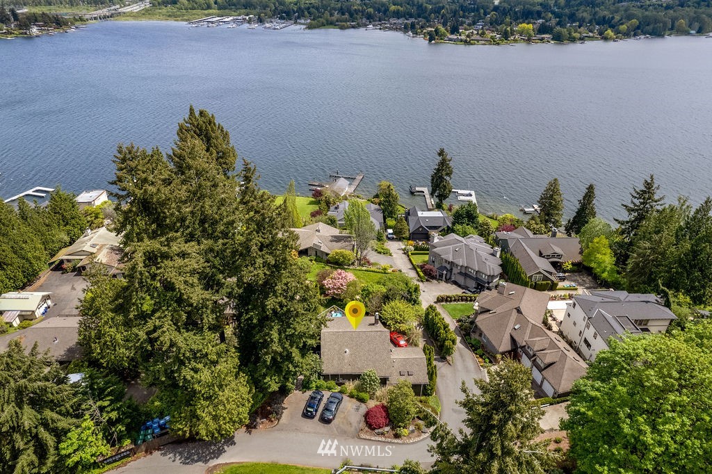 4044 East Mercer Way Mercer Island, WA 98040 - Photo 32 of 37 an aerial view of a house with a yard and lake view