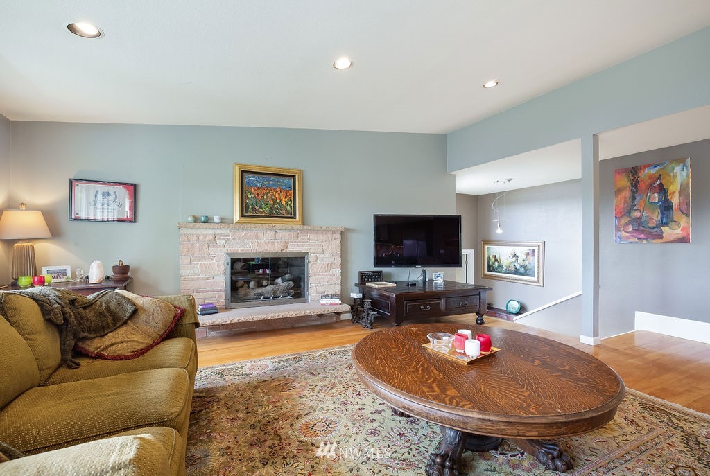 4044 East Mercer Way Mercer Island, WA 98040 - Photo 6 of 37 a living room with furniture and a fireplace