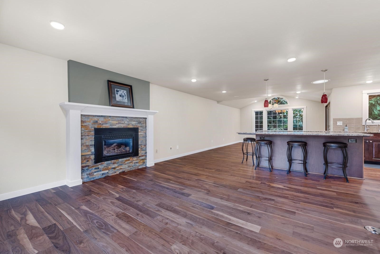 23002 2nd Avenue Southeast Bothell, WA 98021 - Photo 4 of 22 a living room with furniture and a fireplace