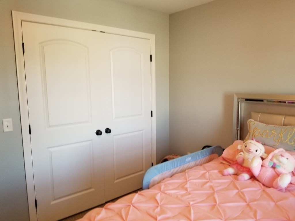 428 Smith Fall River Fall River, MA 02721 - Photo 17 of 31 a bedroom with a bed and a shower