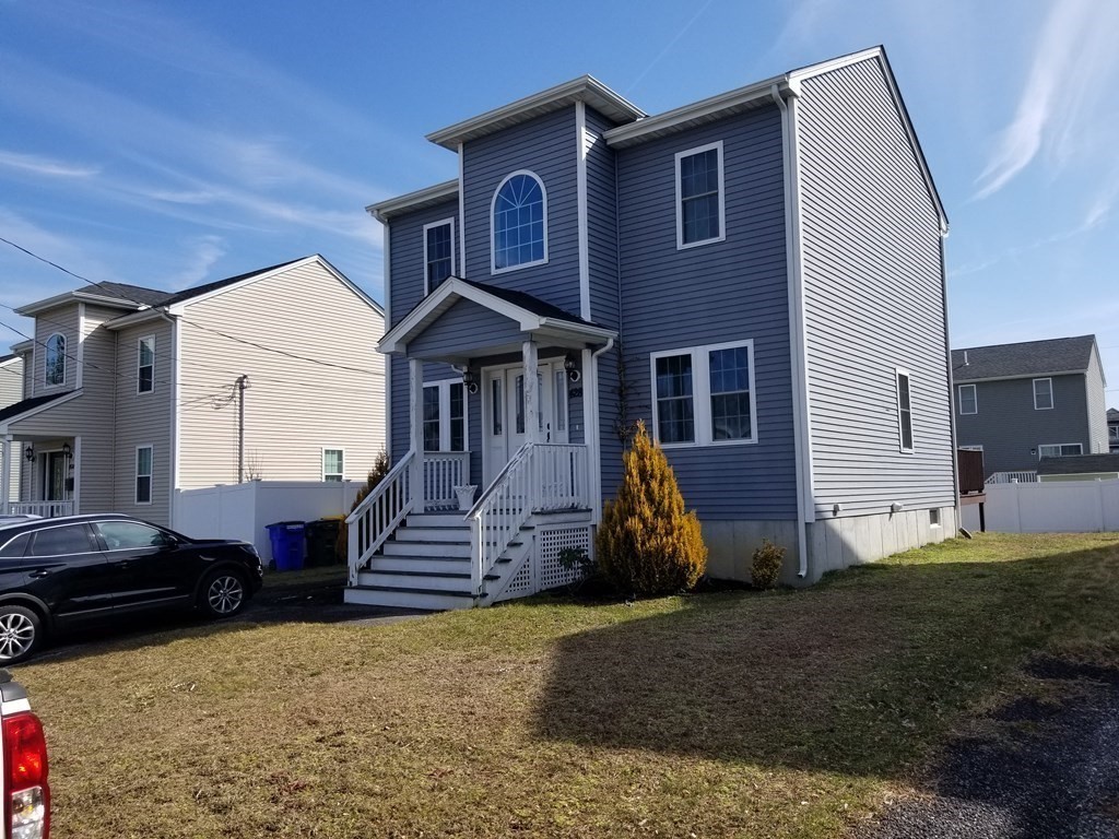 428 Smith Fall River Fall River, MA 02721 - Photo 2 of 31 a front view of a house with a yard