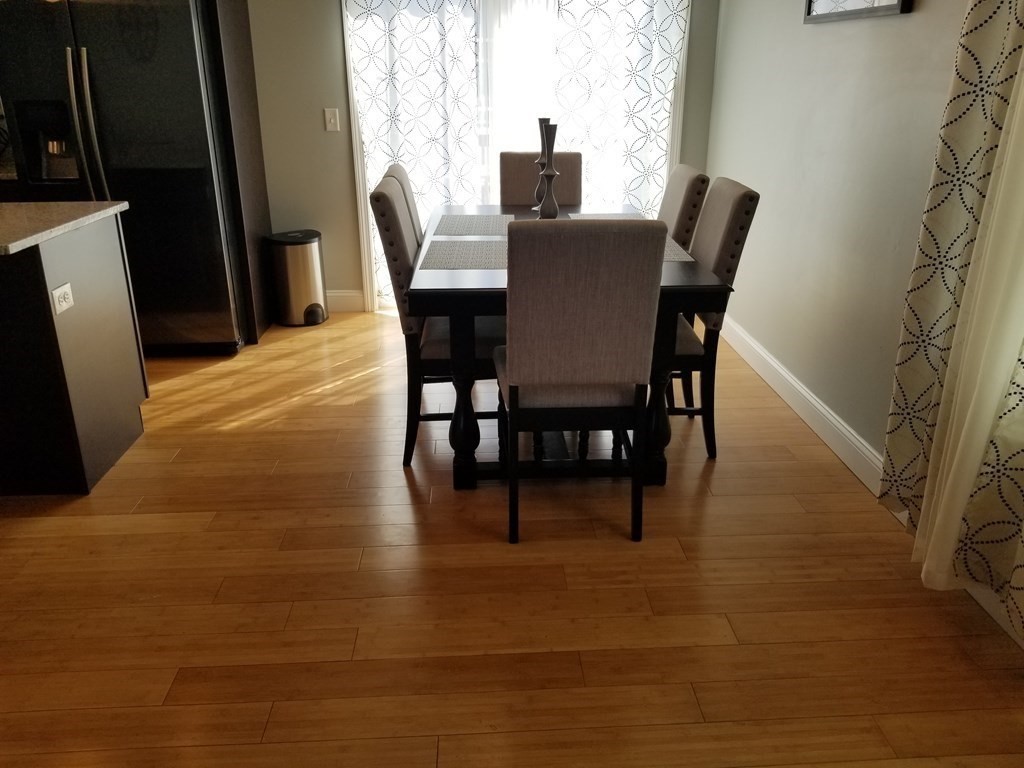 428 Smith Fall River Fall River, MA 02721 - Photo 6 of 31 a view of a dining room with furniture and a window