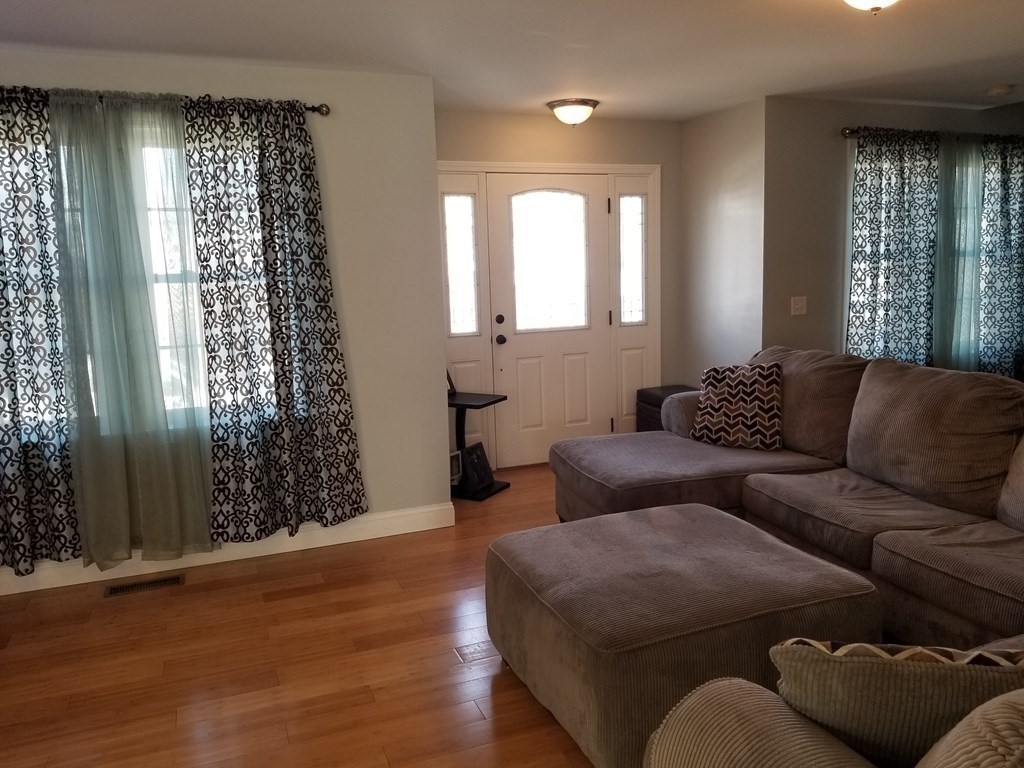 428 Smith Fall River Fall River, MA 02721 - Photo 8 of 31 a living room with furniture and a large window