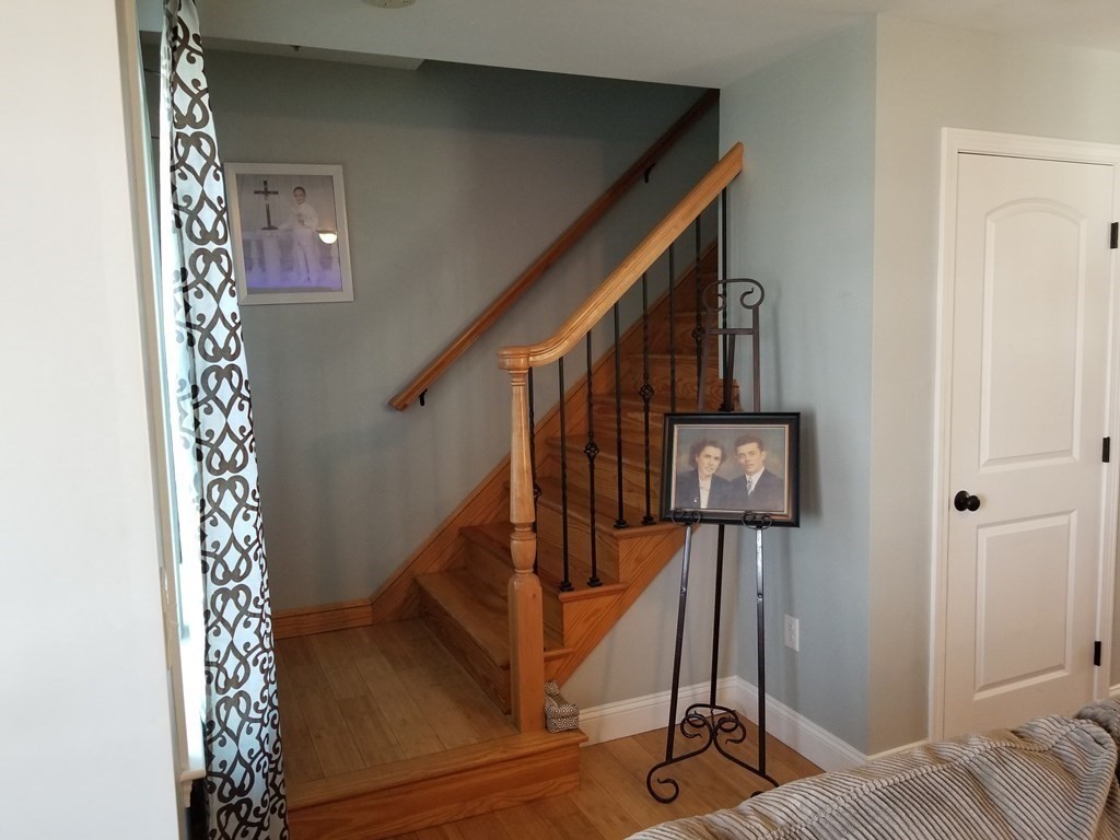 428 Smith Fall River Fall River, MA 02721 - Photo 10 of 31 a view of entryway with wooden floor
