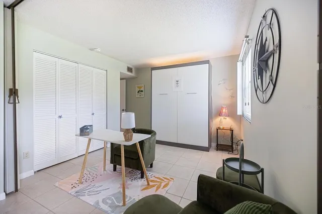 a livingroom with furniture and entryway
