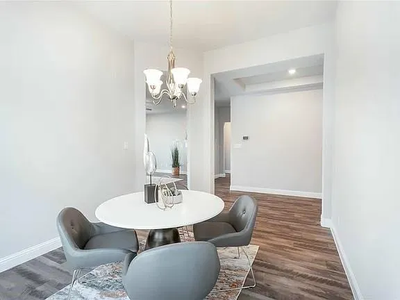 an aerial view of a house with a swimming pool