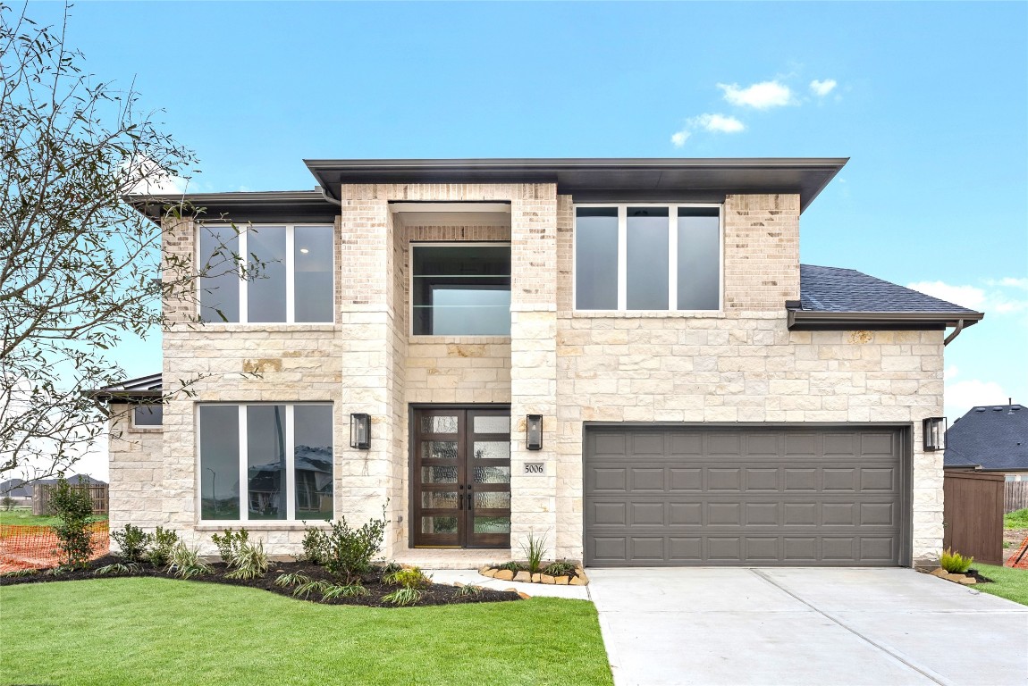 Move in ready. Westin Homes *New Construction* Archer AN plan. Grass is digitally enhanced.