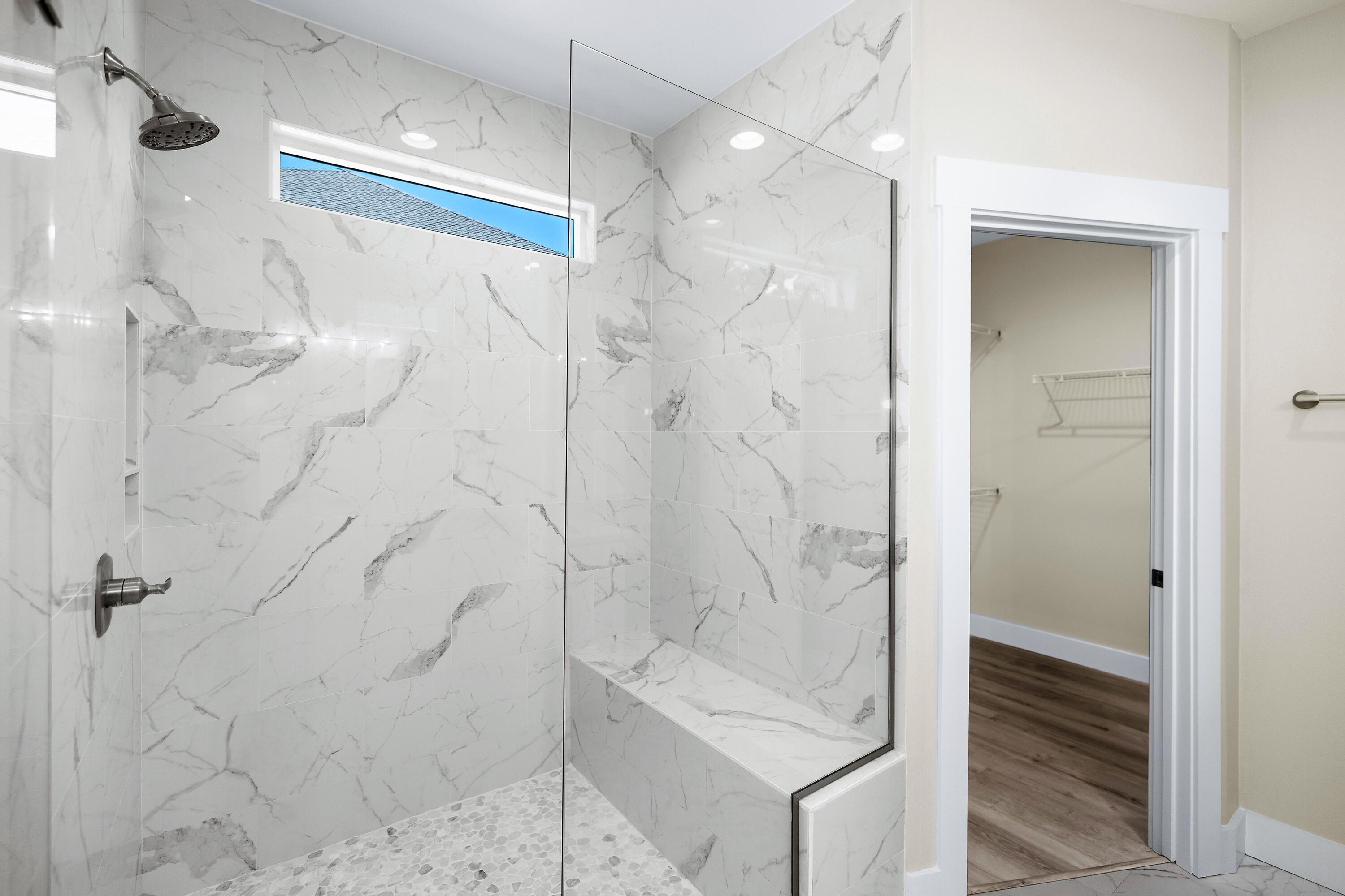 61 Spruce Street Freeport, FL 32439 - Photo 12 of 35 a bathroom with a shower