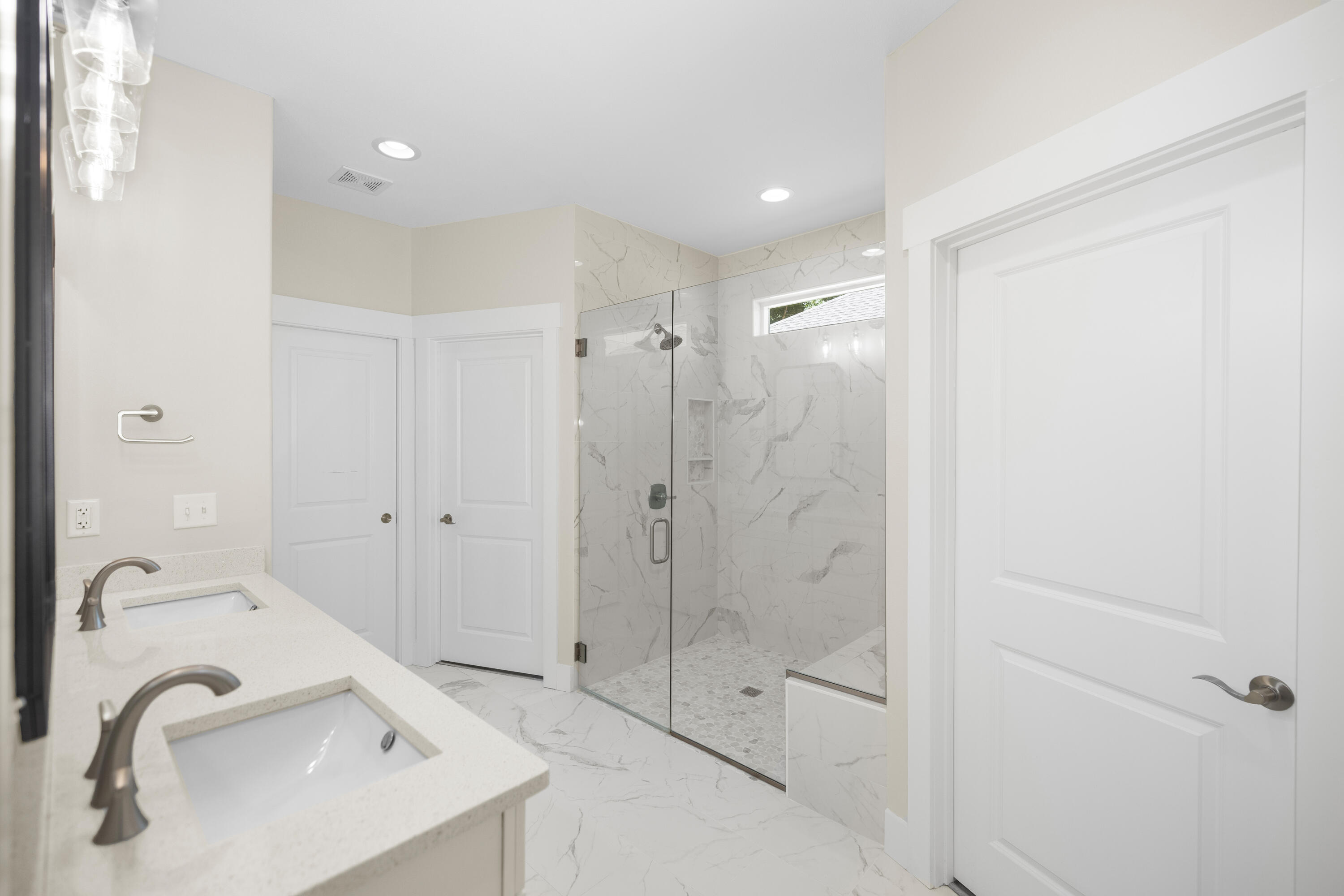 61 Spruce Street Freeport, FL 32439 - Photo 14 of 35 a bathroom with a sink and shower