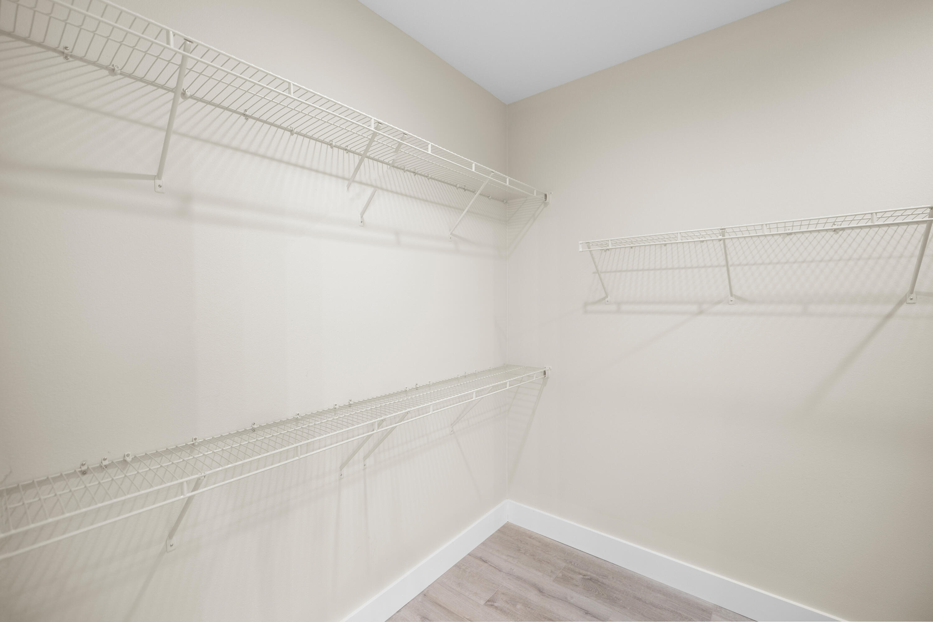 61 Spruce Street Freeport, FL 32439 - Photo 15 of 35 a view of a room with racks on the wall