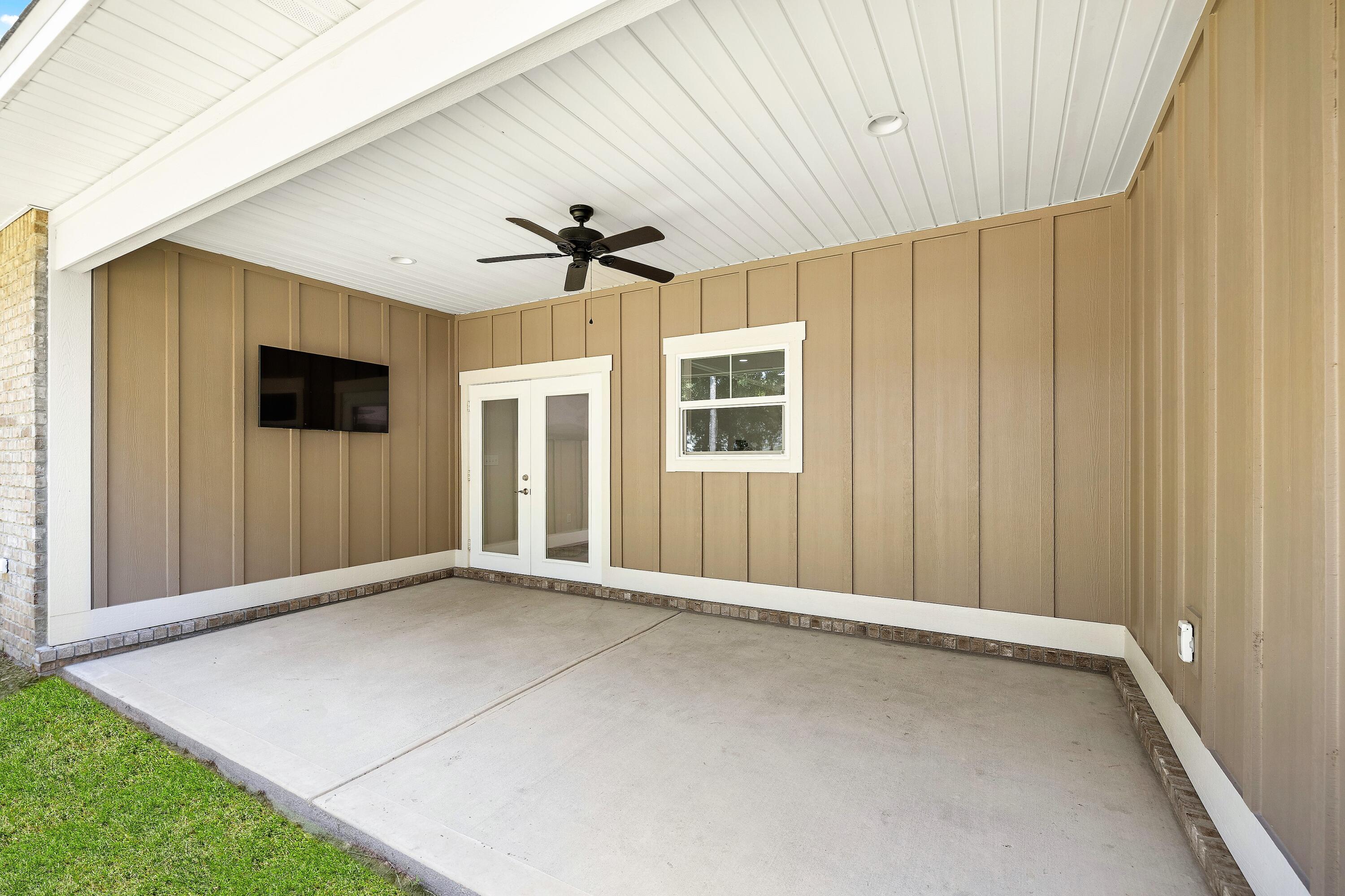 61 Spruce Street Freeport, FL 32439 - Photo 27 of 35 a view of an empty room with a window
