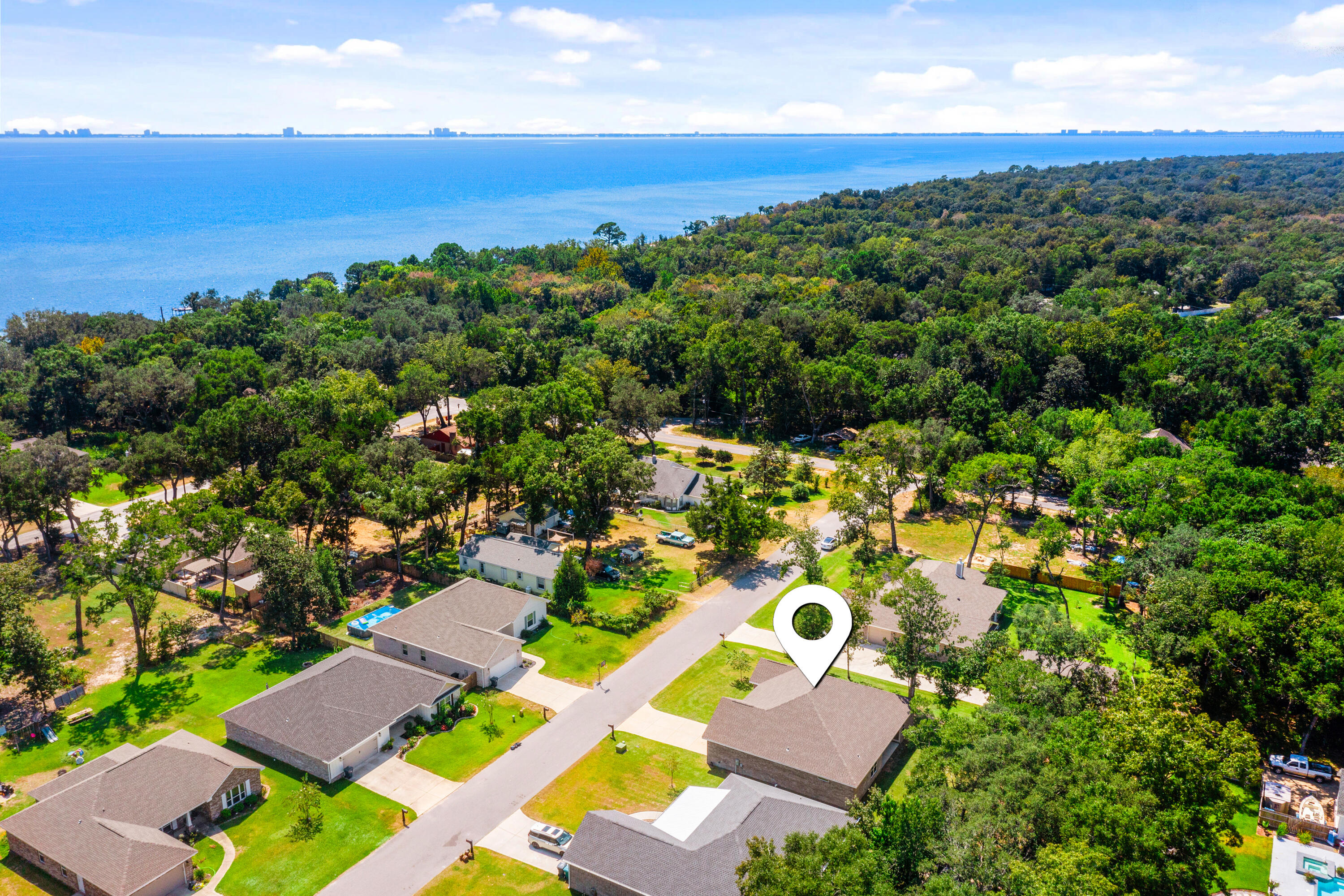 61 Spruce Street Freeport, FL 32439 - Photo 32 of 35 an aerial view of residential houses with outdoor space and street view