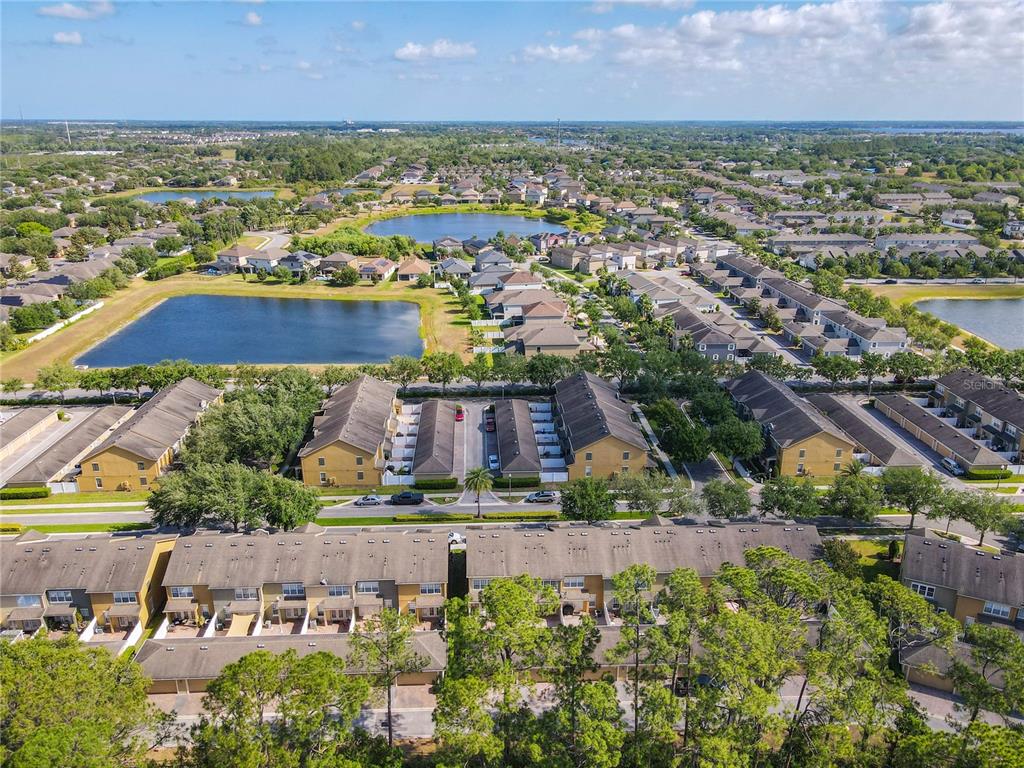 12930 Vennetta Way Windermere, FL 34786 - Photo 37 of 38 an aerial view of residential building and lake