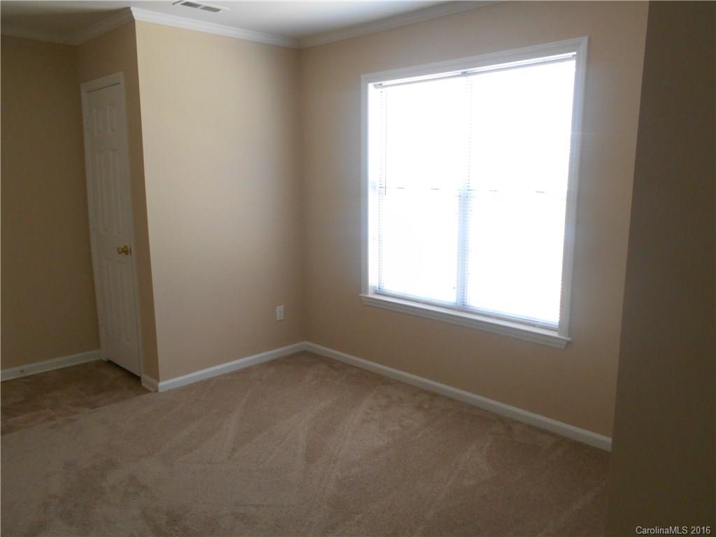 6733 Bevington Ridge Road, Unit A & B Charlotte, NC 28277 - Photo 15 of 18 an empty room with a window