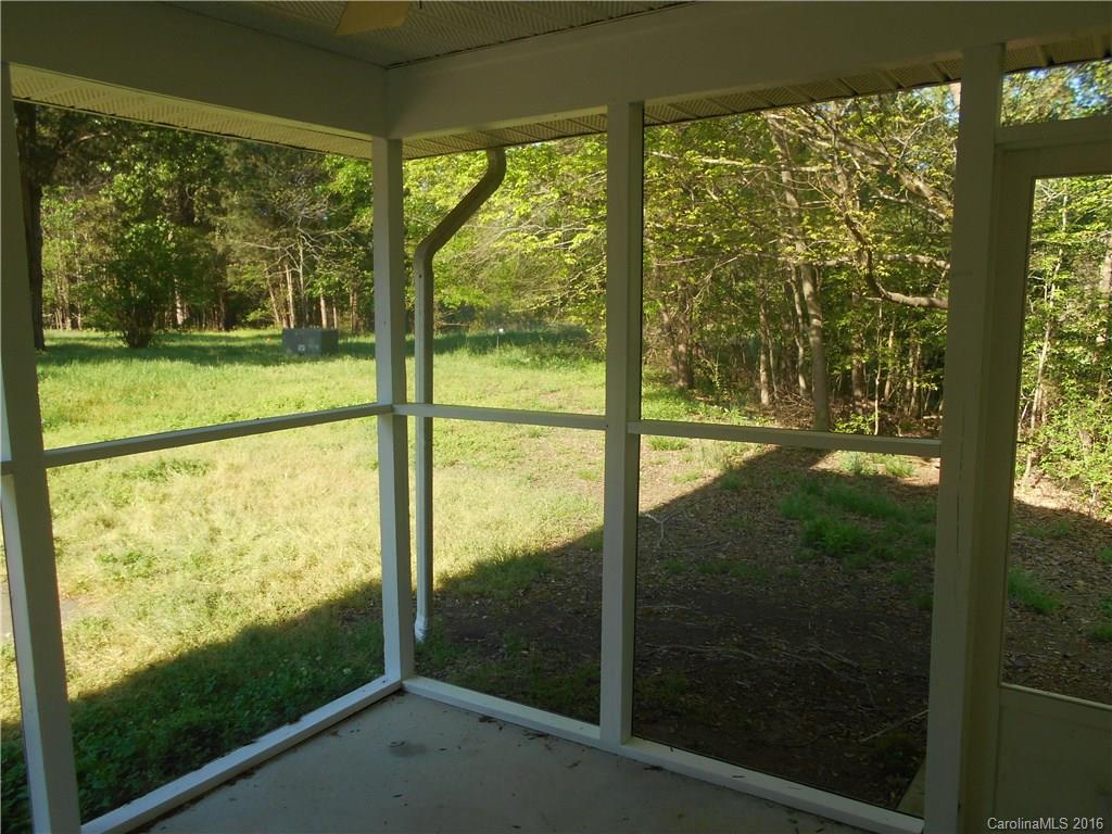 6733 Bevington Ridge Road, Unit A & B Charlotte, NC 28277 - Photo 16 of 18 a view of an outdoor space and deck