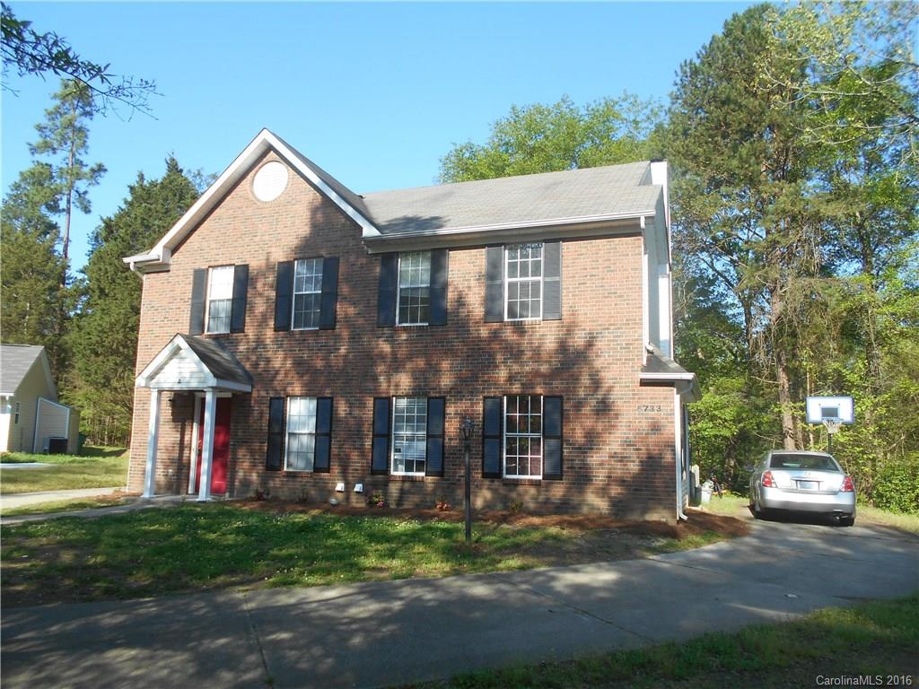 6733 Bevington Ridge Road, Unit A & B Charlotte, NC 28277 - Photo 18 of 18 a front view of a house with a yard