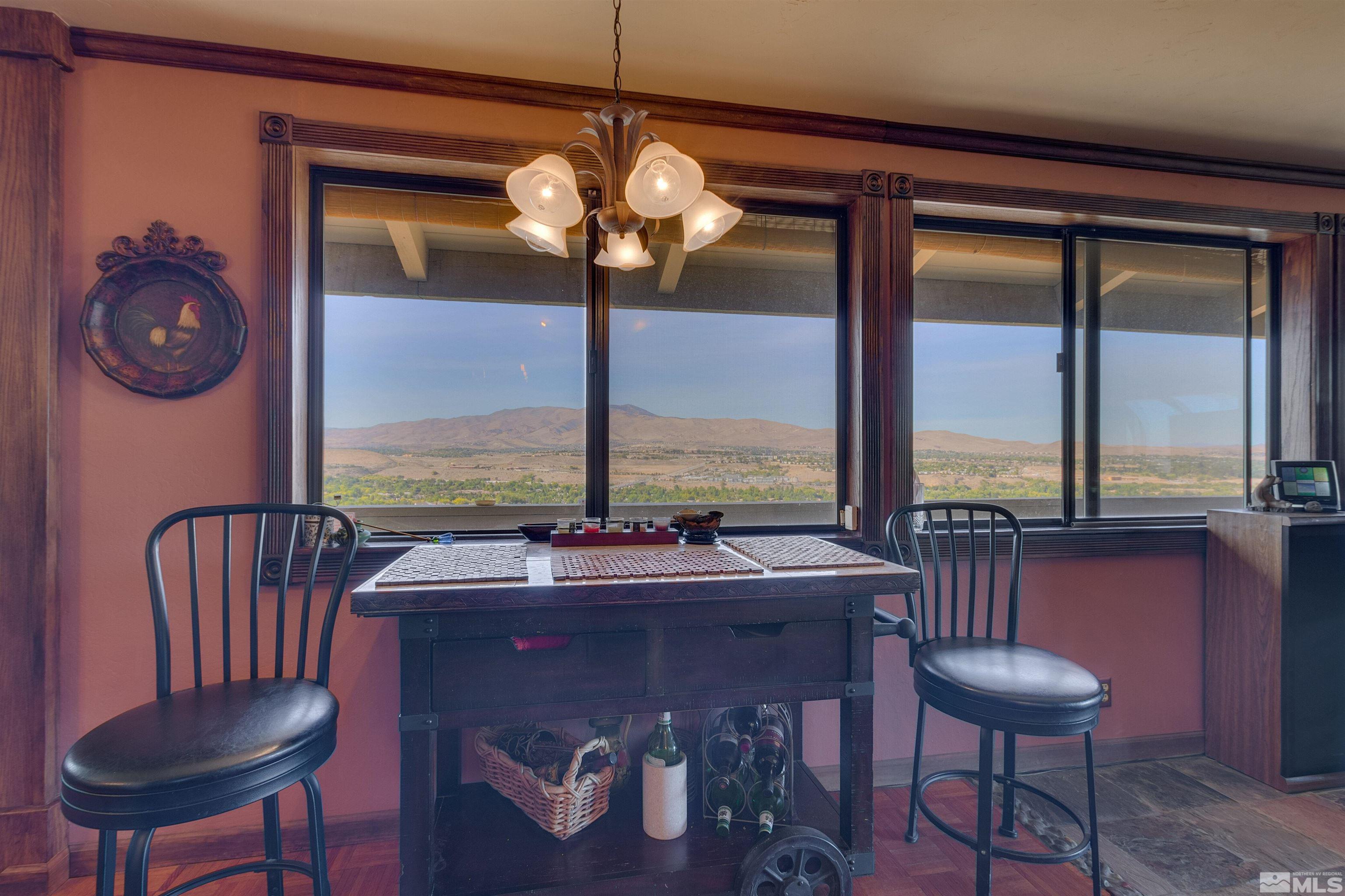 2087 Chanslor Circle Reno, NV 89509 - Photo 12 of 29 a view of a dining room with furniture window and outside view