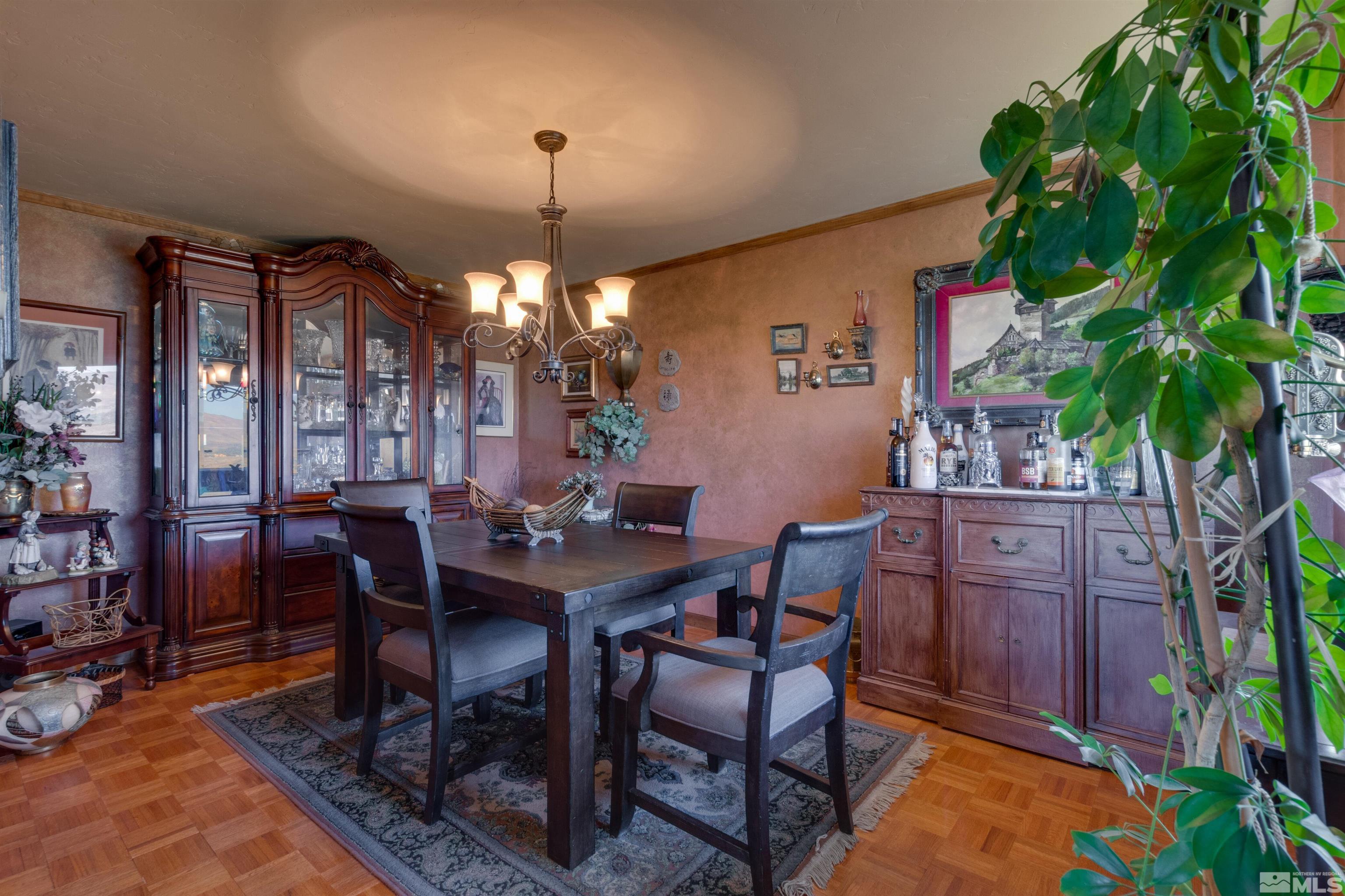 2087 Chanslor Circle Reno, NV 89509 - Photo 18 of 29 a view of a dining room with furniture and chandelier