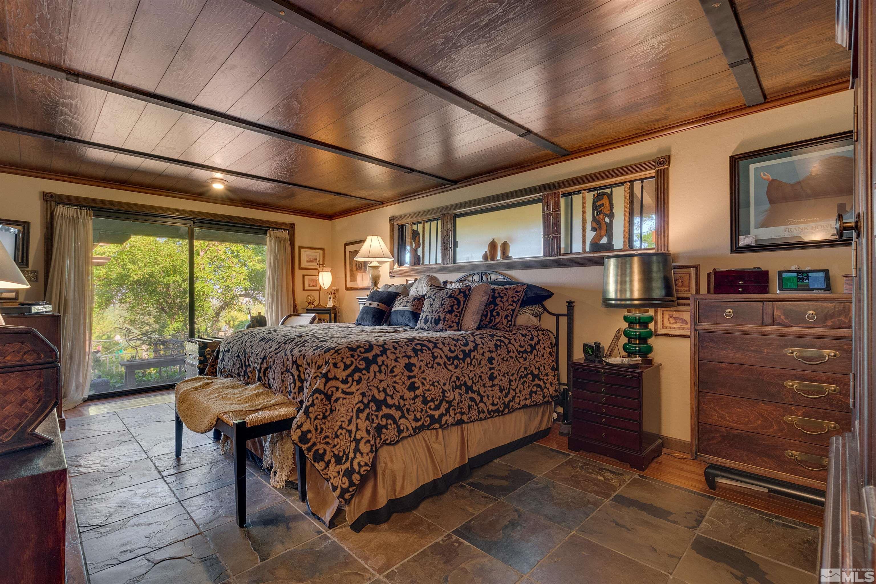2087 Chanslor Circle Reno, NV 89509 - Photo 20 of 29 a bed room with a bed and a television