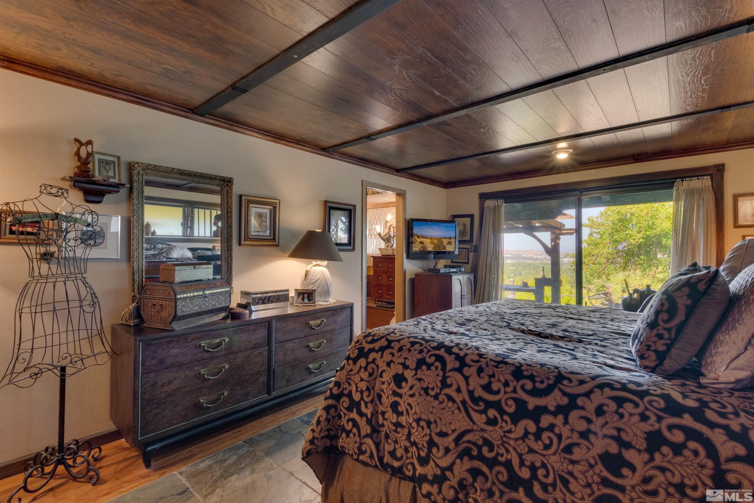 2087 Chanslor Circle Reno, NV 89509 - Photo 21 of 29 a bed room with a bed and a dresser