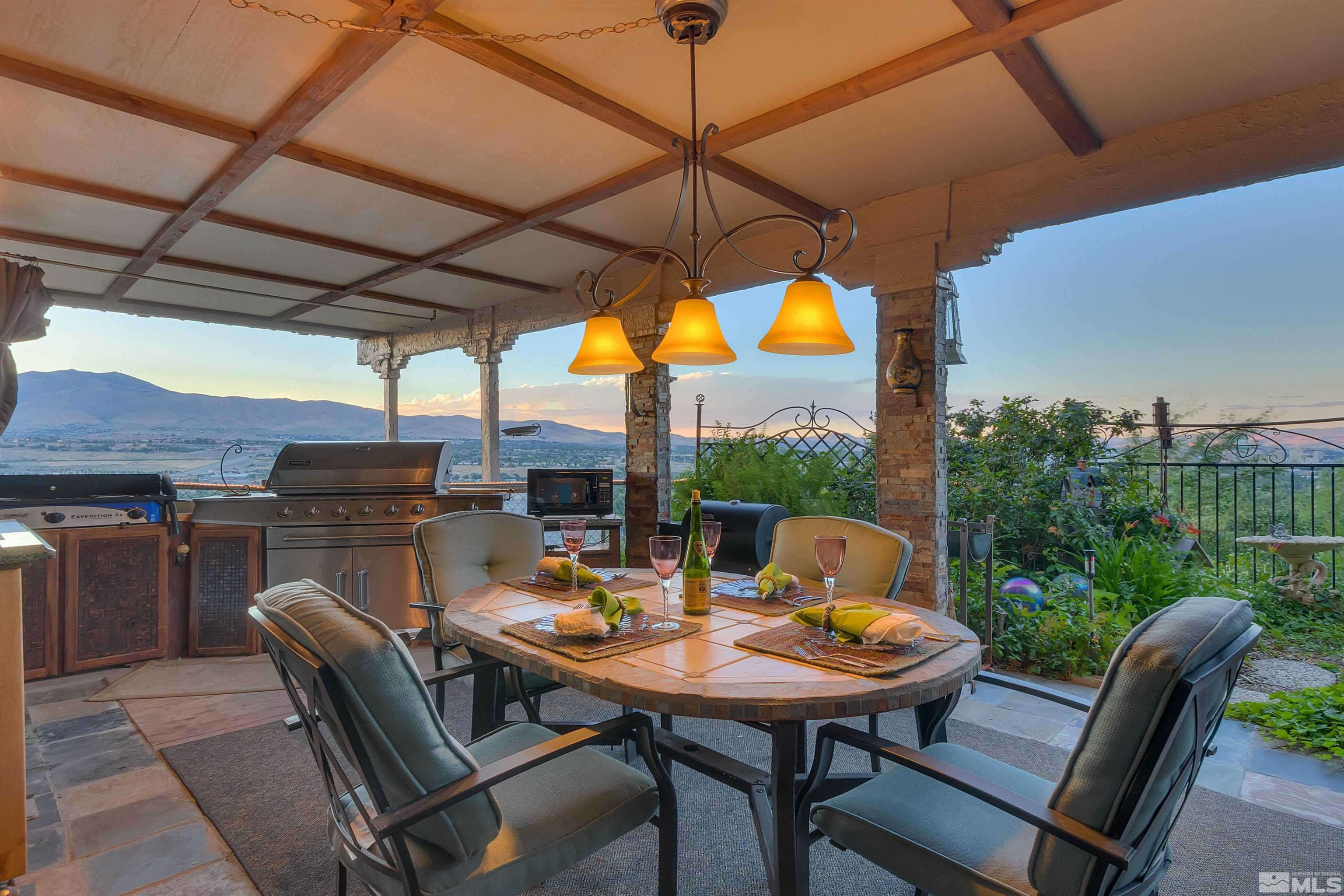 2087 Chanslor Circle Reno, NV 89509 - Photo 5 of 29 a view of an outdoor dining space with a table and chairs