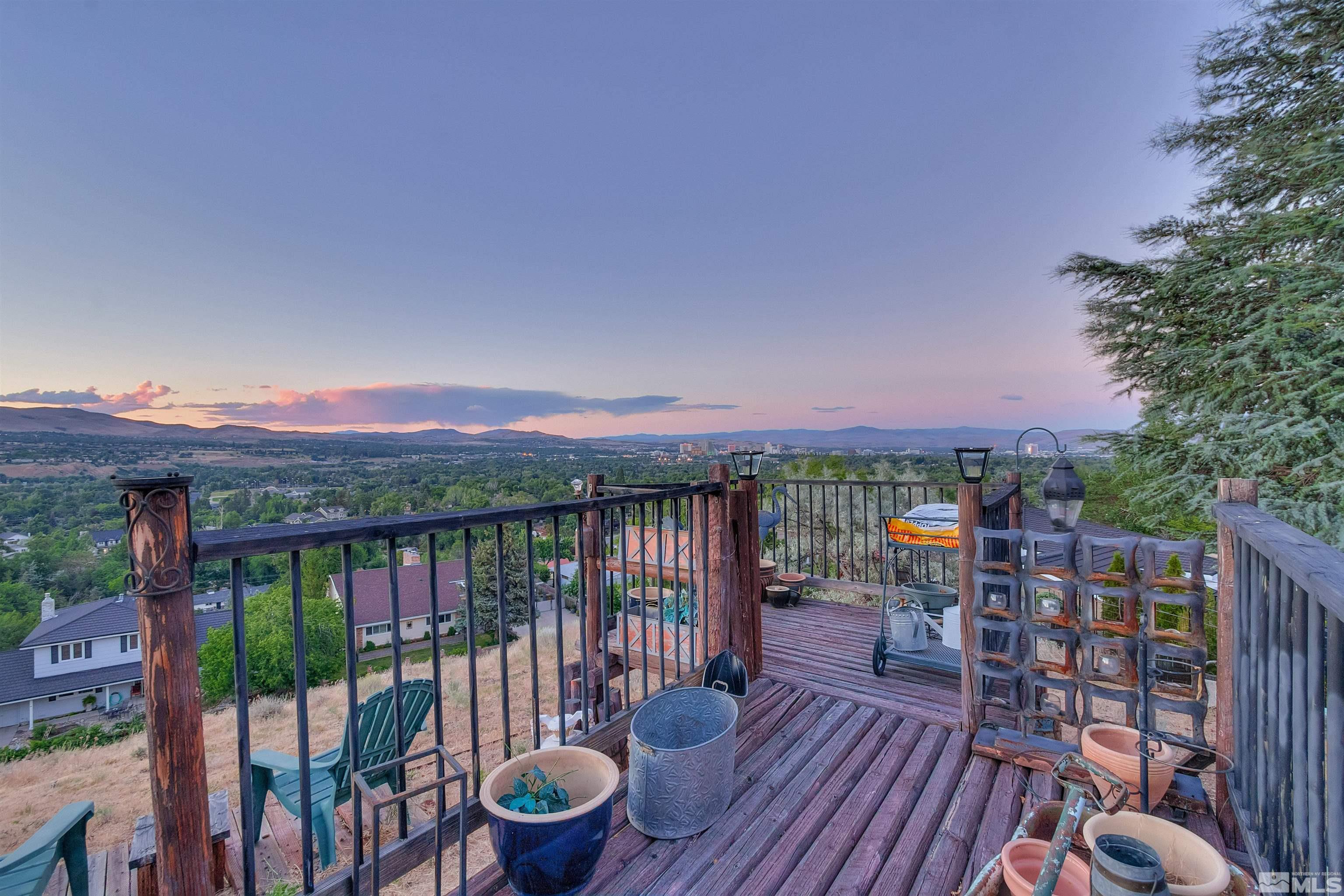 2087 Chanslor Circle Reno, NV 89509 - Photo 7 of 29 a view of a balcony with furniture and wooden floor