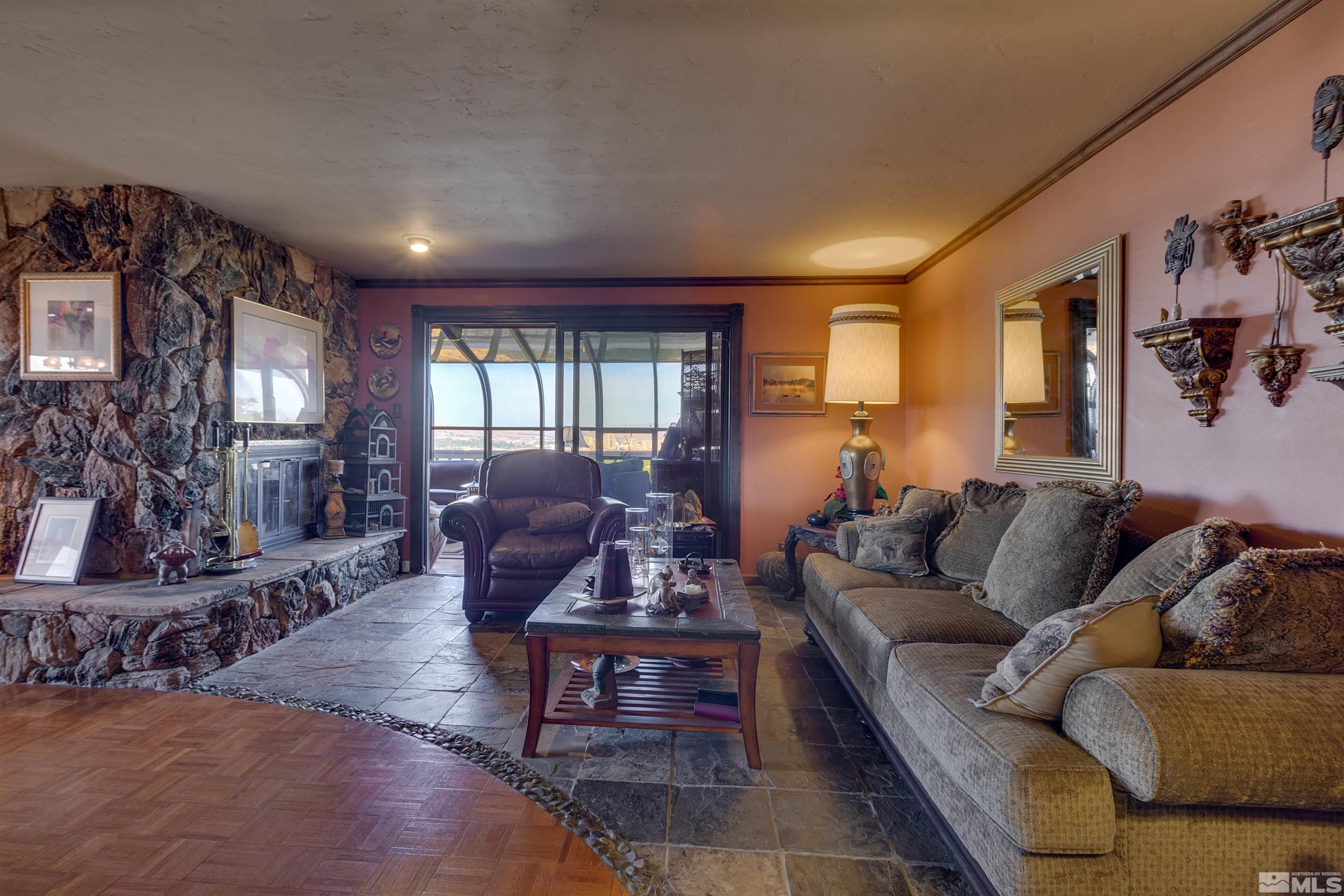 2087 Chanslor Circle Reno, NV 89509 - Photo 10 of 29 a living room with furniture and wooden floor