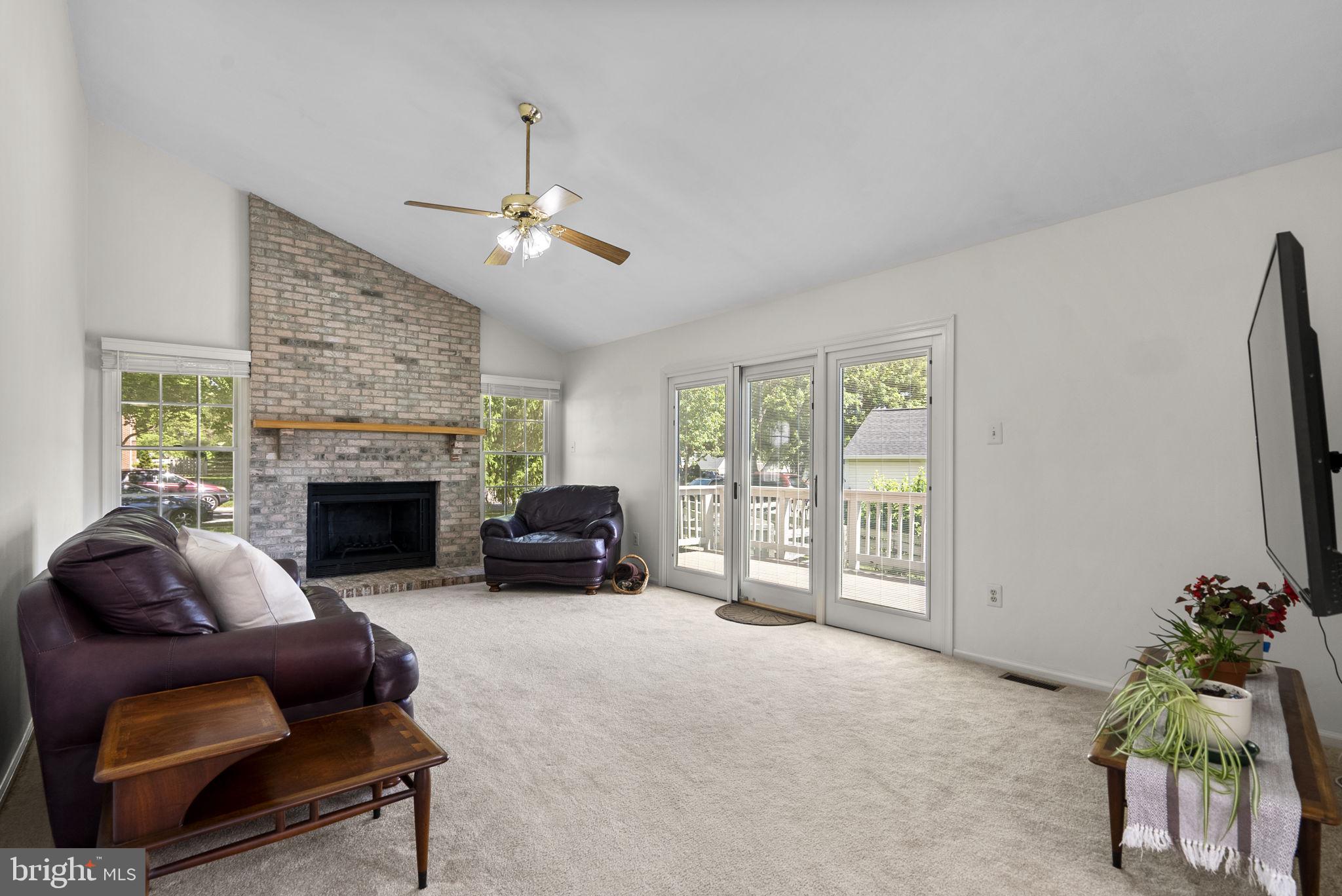 8201 Sandy Stream Road Laurel, MD 20723 - Photo 9 of 51 Family room with tall vaulted ceilings