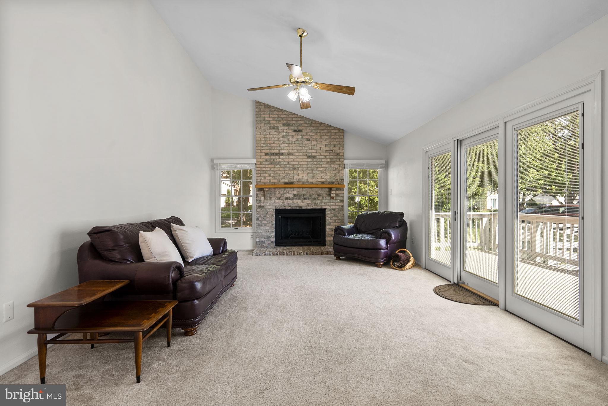 8201 Sandy Stream Road Laurel, MD 20723 - Photo 10 of 51 Floor to ceiling brick wood burning fireplace