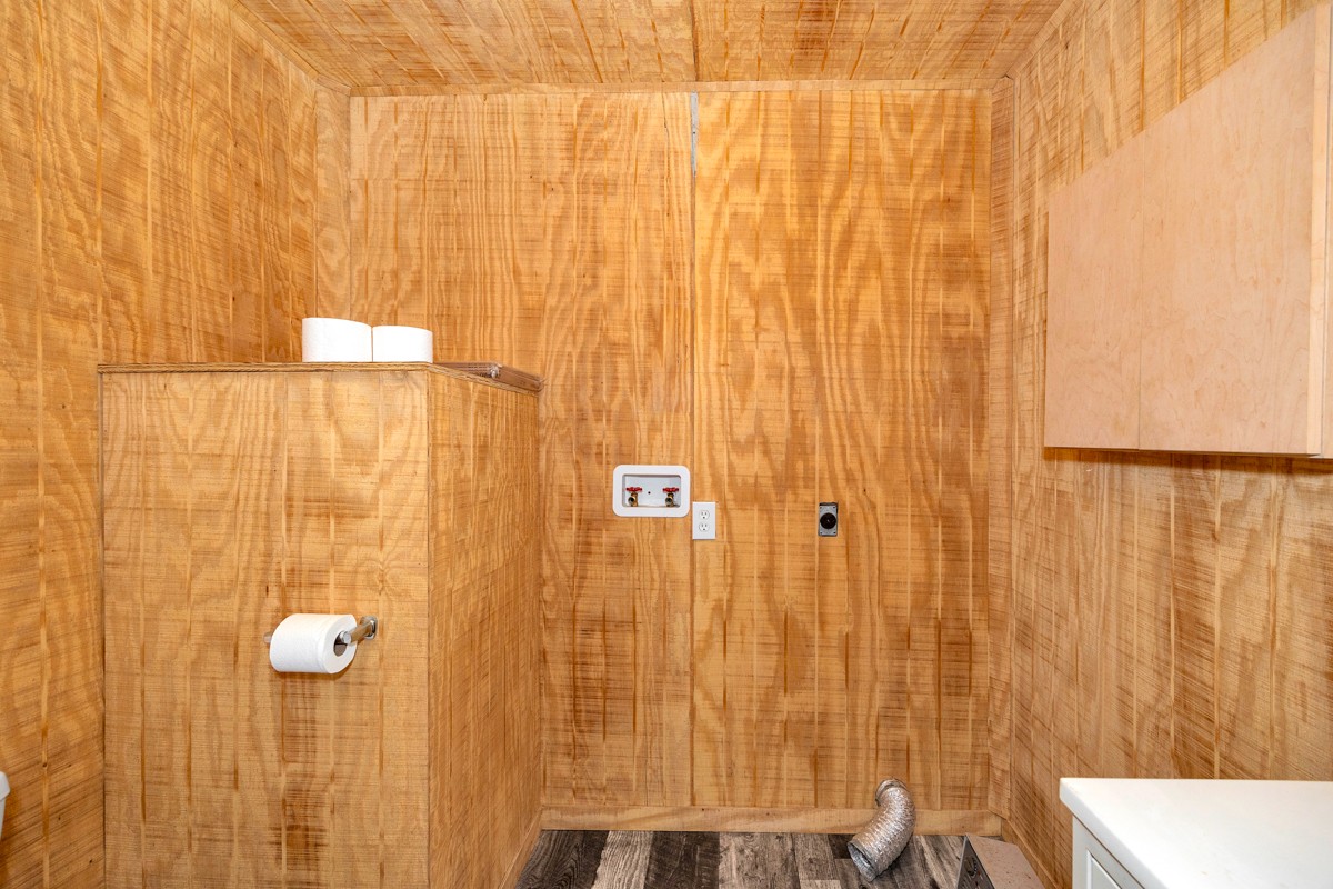 167 Henry Bayless Road Ardmore, TN 38449 - Photo 11 of 30 a bathroom with a shower curtain and sink